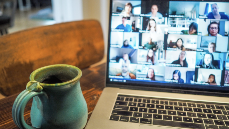 Image of a laptop screen showing an online meeting