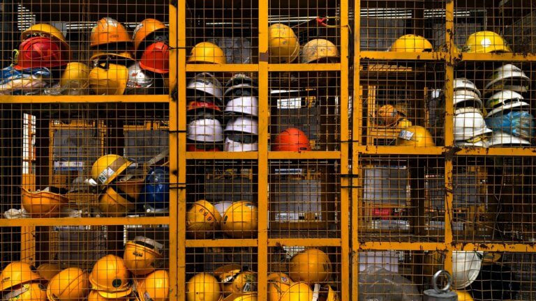 Photo of construction hard hats in lockers