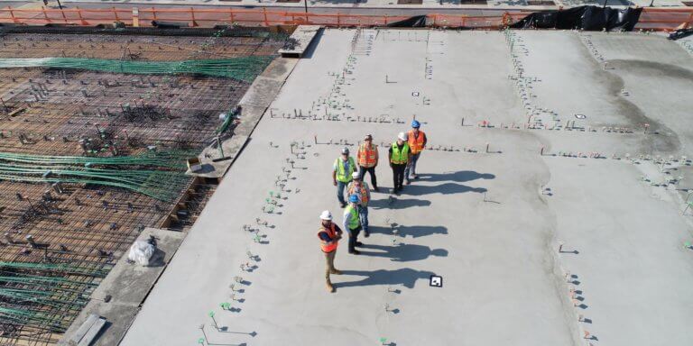 Photo of a team of construction workers on a building site
